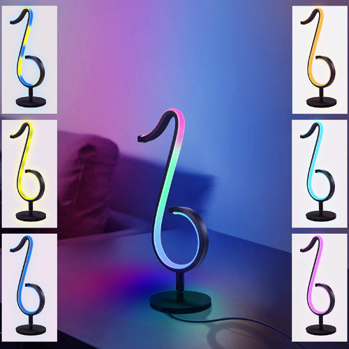 Neon light shaped like a musical note with RGB color changes on a gradient background.