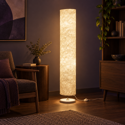 Smart RGB Floor Lamp in warm white mode beside a reading chair