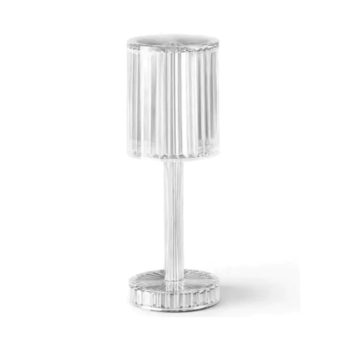 Silver cylindrical object with ribbed design on a white background